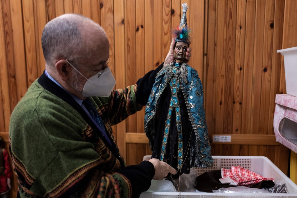 Puppeteer Augusto Grilli, 80, at his Alfa Theatre laboratory in Turin, Italy. Photo: Marco Bertorello/AFP