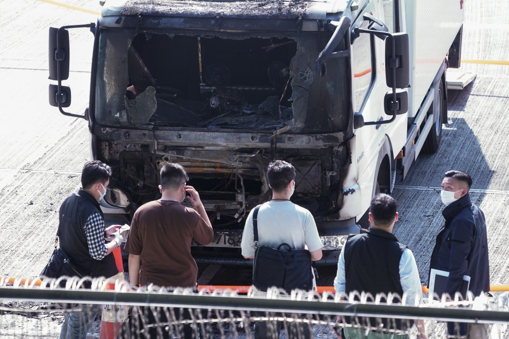 A burned out truck is seen in the car park of a police sports club following a petrol bomb attack earlier this month. Photo: Felix Wong