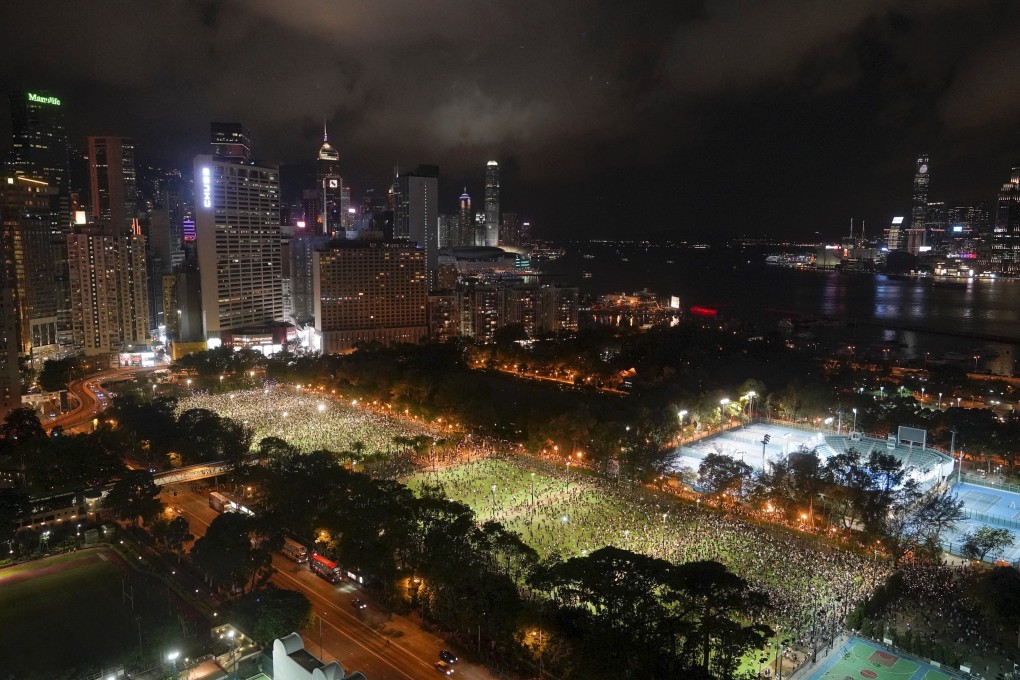 People gather for a vigil for the victims of the 1989 Tiananmen Square Massacre at Victoria Park in Causeway Bay, Hong Kong on June 4. Photo: AP