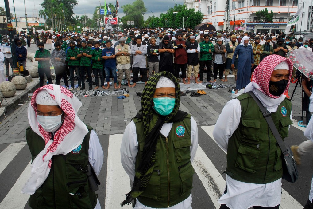 Supporters of Indonesian Muslim cleric Rizieq Shihab gather to protest in Yogyakarta, Indonesia, on Friday. Photo: AFP
