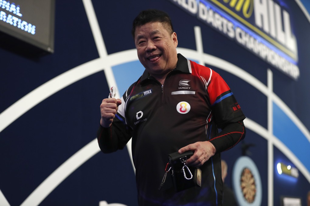 Paul Lim, of Singapore, reacts during his first-round match against England’s Luke Humphries during day four of the PDC William Hill World Darts Championship at Alexandra Palace. Photo: Getty Images