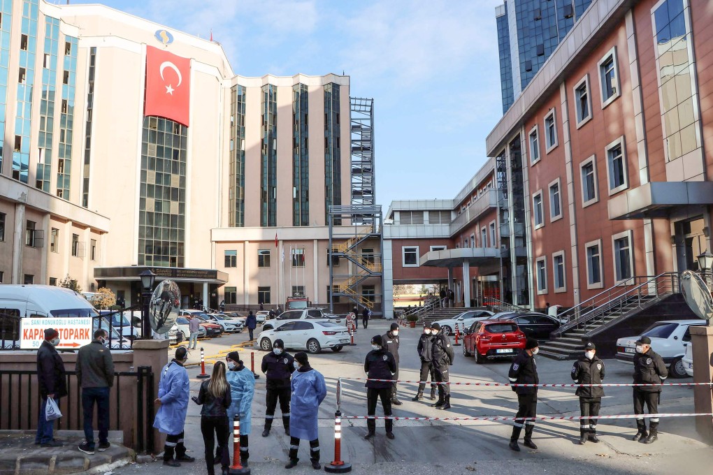Police cordon off the area in front of the privately run Sanko University Hospital in Gaziantep, Turkey, after 10 patients, all infected with Covid-19, died in a fire on Saturday. Photo: Demiroren News Agency (DHA) / AFP