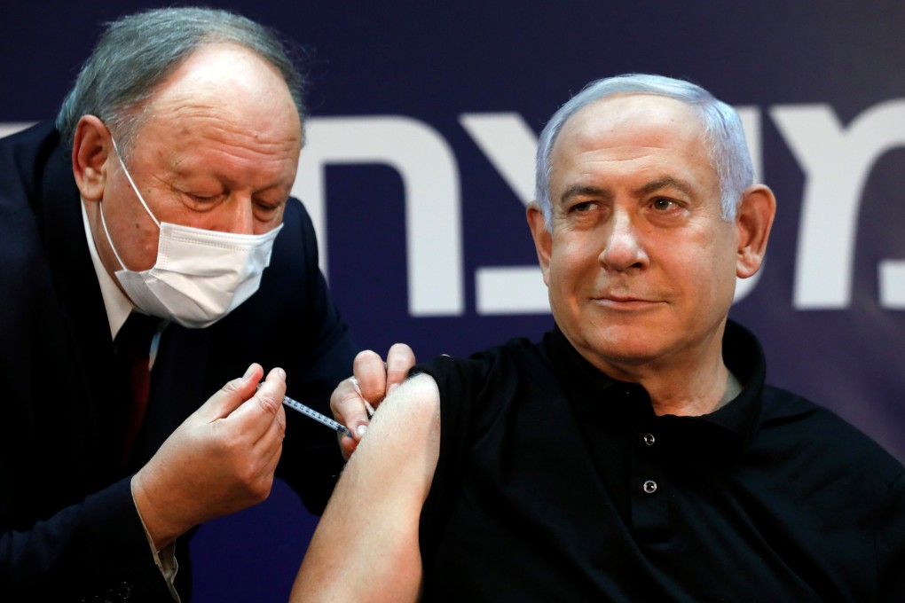 Israeli Prime Minister Minister Benjamin Netanyahu receives a coronavirus vaccination at Sheba Medical Center in Ramat Gan, Israel on Saturday. Photo: Reuters