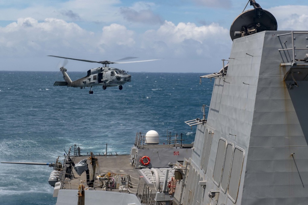 This file photo shows a helicopter taking off from the USS Mustin, which Beijing says disrupted stability by transiting through the Taiwan Strait on Saturday. Photo: US Navy