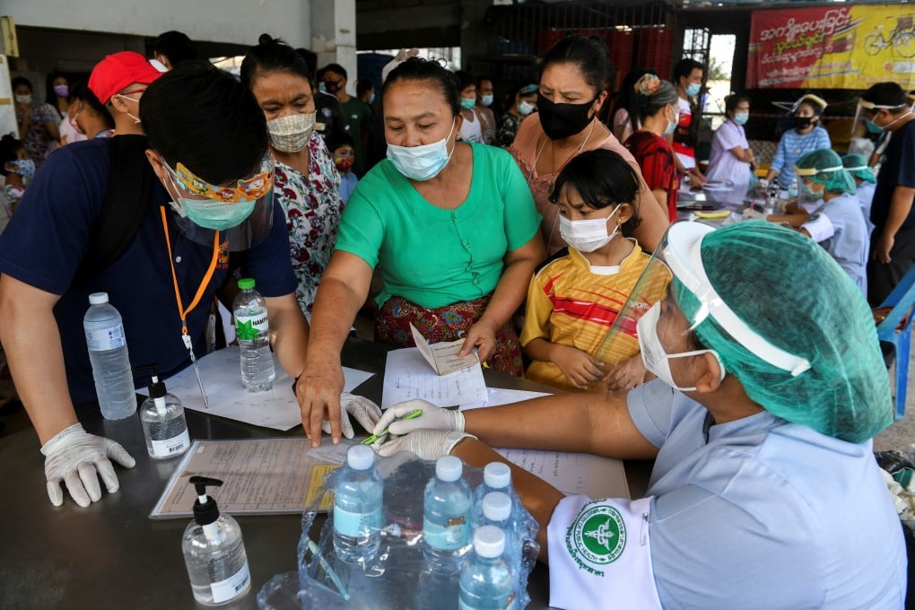 Migrant workers at a seafood market in Samut Sakhon province, Thailand. Photo: Reuters
