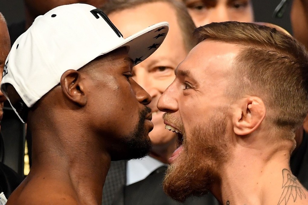 Retired boxing legend Floyd Mayweather Jnr and former UFC double champion Conor McGregor face off after the official weigh-ins for their superfight in Las Vegas in 2017. Photo: AFP