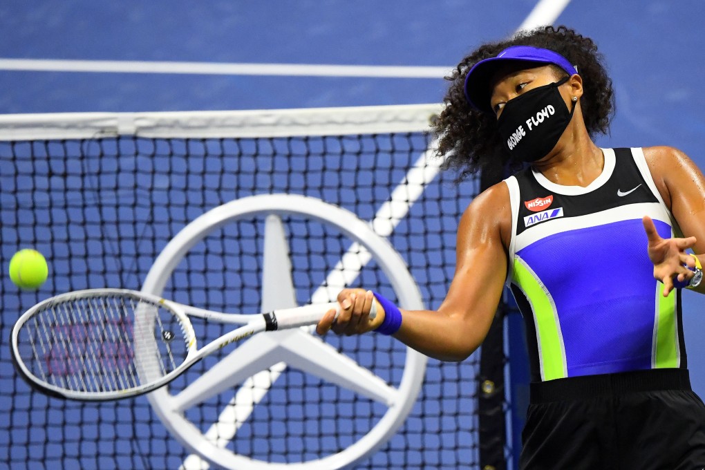 Naomi Osaka, wearing a George Floyd mask, hits balls into the stands on her way to victory at the 2020 US Open. Photo: USA Today