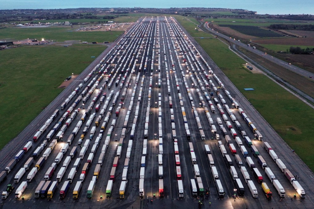 Lines of freight lorries parked on the tarmac at Manston Airport near Ramsgate, southeast England. France was reopening cross-border travel with Britain on Wednesday. Photo: AFP