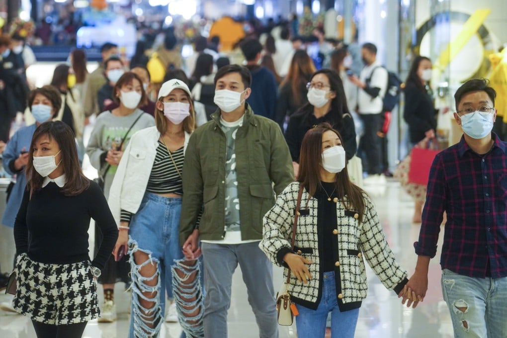 Commuters wearing face masks at a shopping mall in Tsim Sha Tsui, Hong Kong amid the city’s fourth wave of Covid-19 cases. Photo: Winson Wong