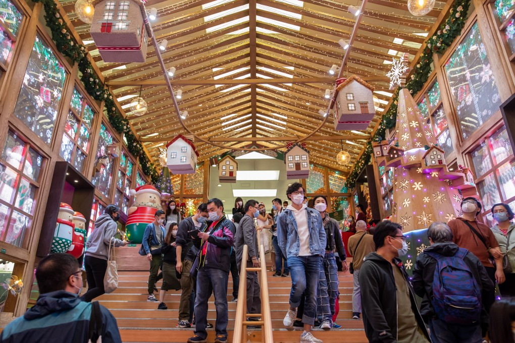 People at a shopping mall in Tsim Sha Tsui, Hong Kong. Photo: Bloomberg