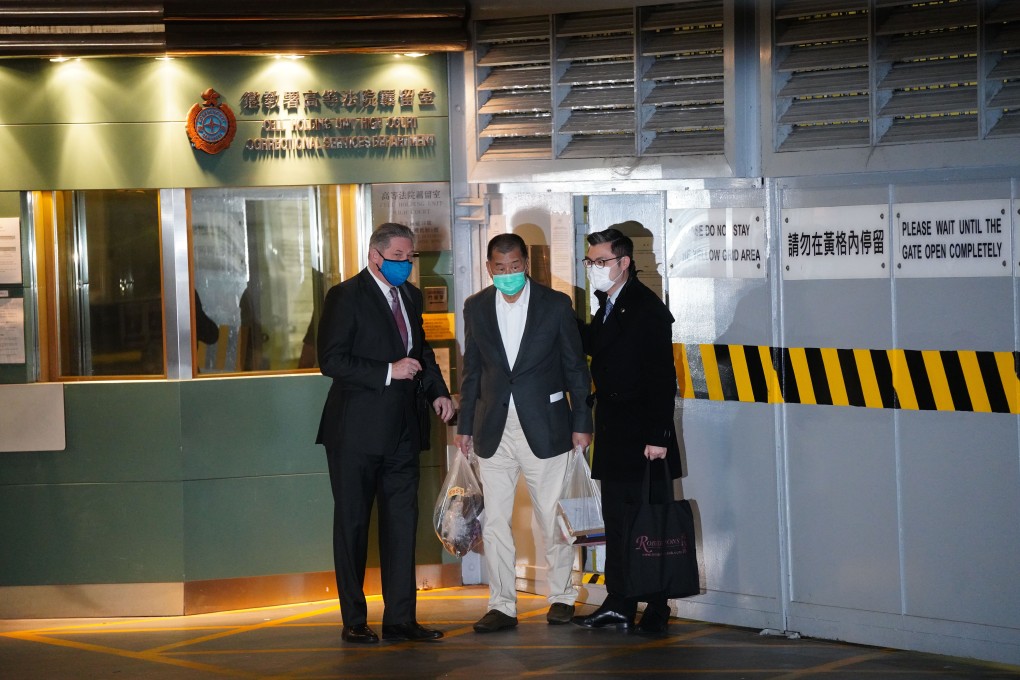 Jimmy Lai leaves the High Court on Wednesday night with his lawyers. Photo: Sam Tsang