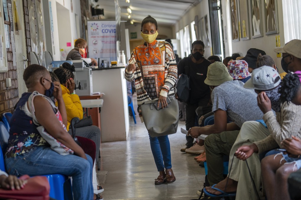 Volunteers wait to be checked at a vaccine trial facility at Soweto’s Chris Sani Baragwanath Hospital outside Johannesburg, South Africa. File photo: AP