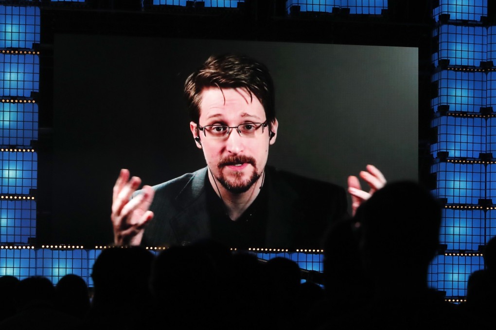 Former NSA contractor Edward Snowden addresses attendees through video link at the Web Summit technology conference in Lisbon in 2019. File photo: AP