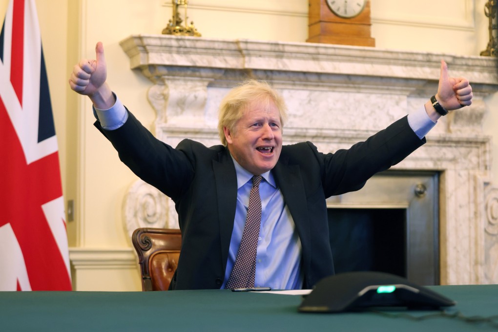 British Prime Minister Boris Johnson tweeted a picture of himself inside No 10 Downing Street, raising both arms in a thumbs-up gesture. Photo: Boris Johnson via Twitter