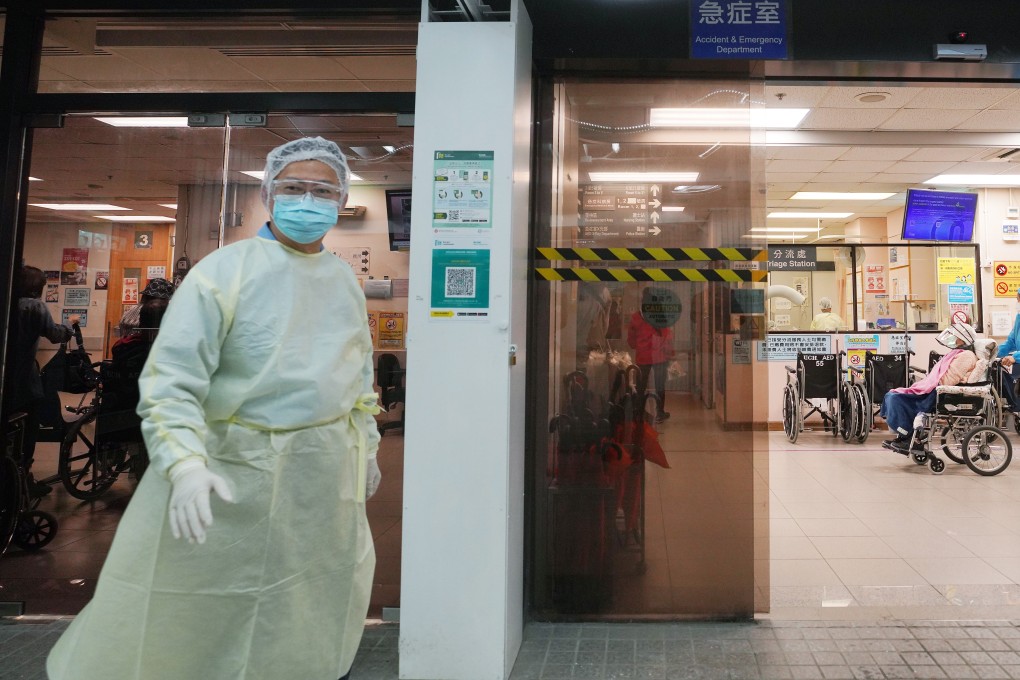 A medical worker stands outside United Christian Hospital. Photo: Winson Wong