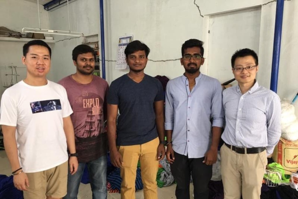 Siva Kumar, centre, with his colleagues in 2018. Photo: Siva Kumar