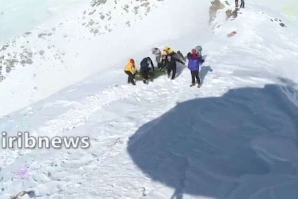 A screen grab from footage broadcast on Iranian state TV shows a rescue operation after eight climbers were found dead and at least seven others were missing due to avalanches north of Tehran. Photo: Irib News Agency / AFP