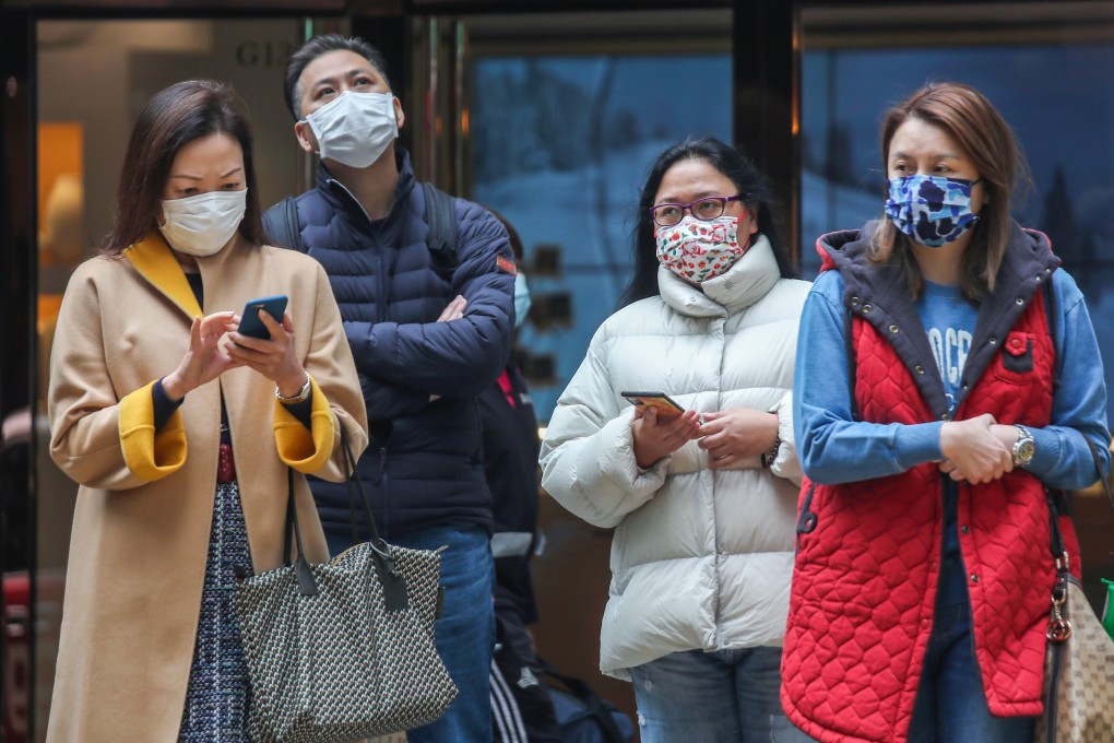 Pedestrians bundled up for cool weather in Hong Kong’s Central district. Photo: Xiaomei Chen