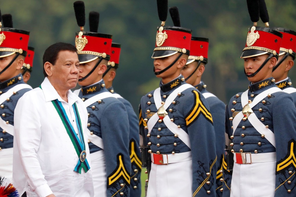 Philippines President Rodrigo Duterte reviews military cadets. Photo: Reuters