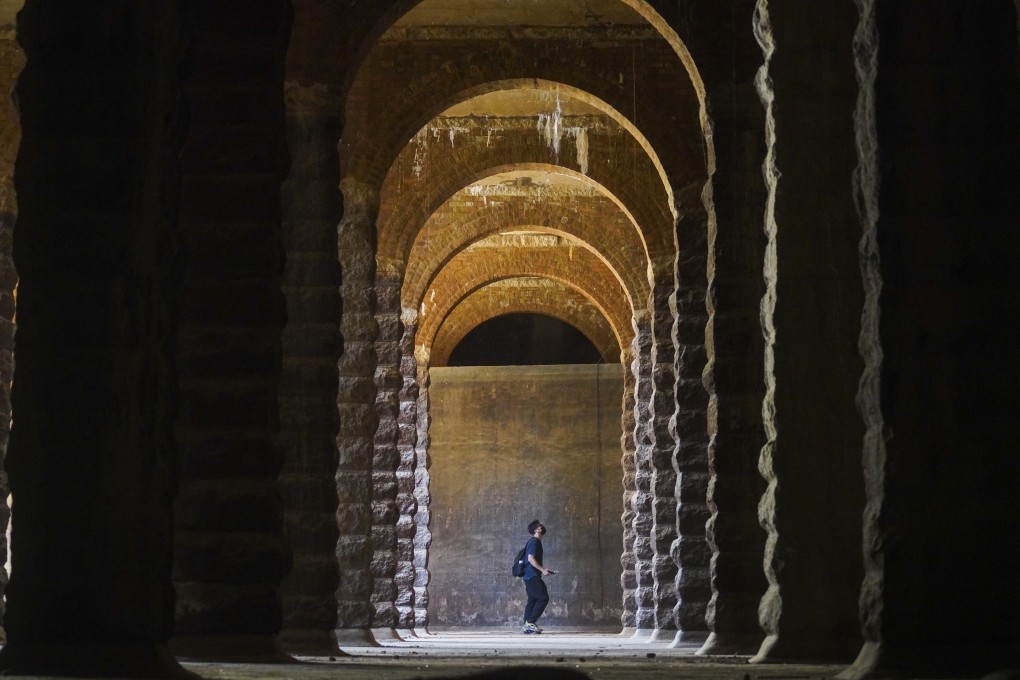 A visitor looks at the recently unearthed service reservoir on Bishop Hill, believed to have been built in 1904. Photo: Winson Wong