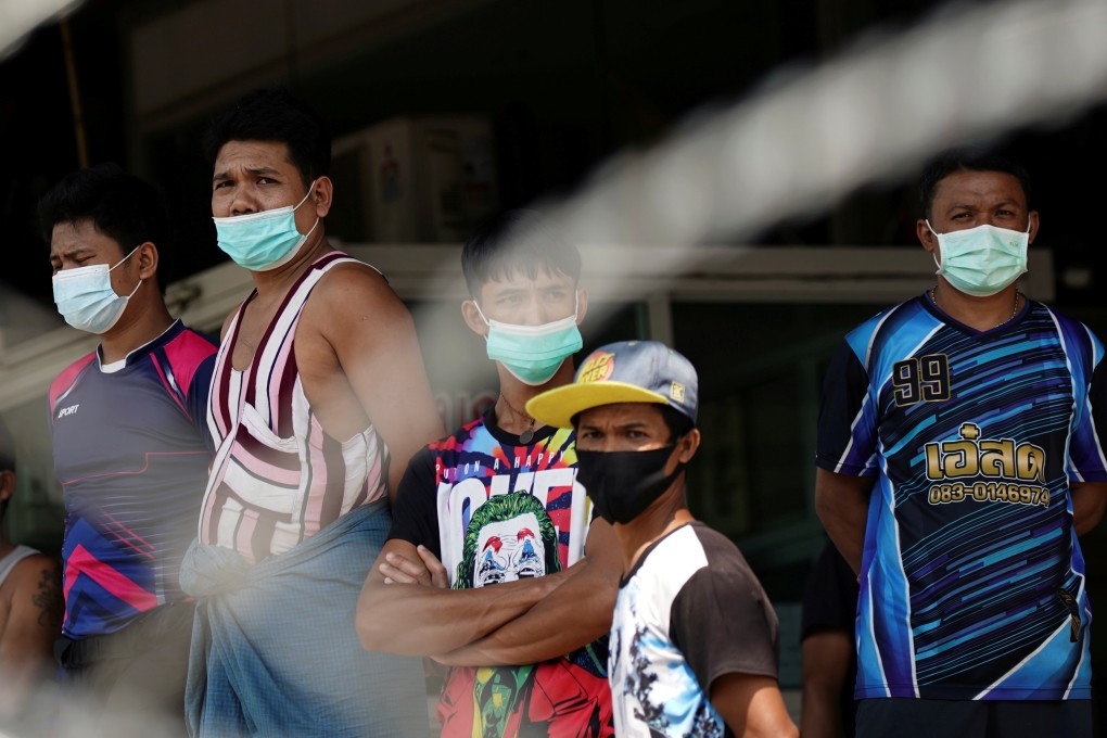 Migrant workers at a closed shrimp market in Samut Sakhon province, the centre of Thailand’s latest outbreak. Photo: Reuters