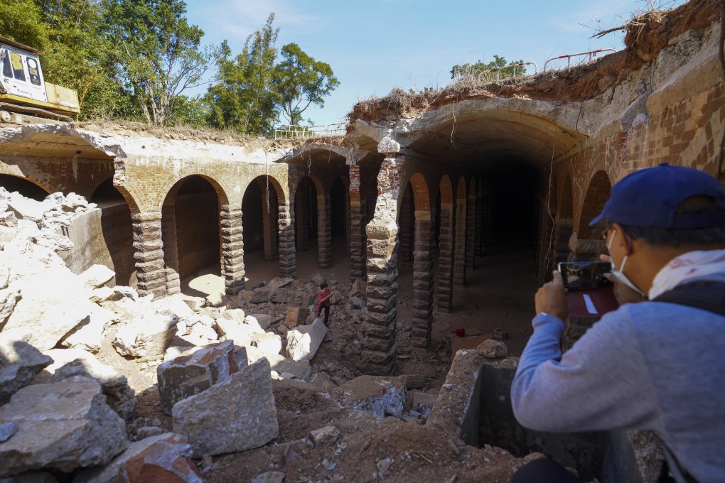 Visitors at the century-old service reservoir featuring Roman-style arches and columns, in Bishop Hill, Shek Kip Mei, on December 28. A public outcry has put a halt to demolition works. Photo: Winson Wong