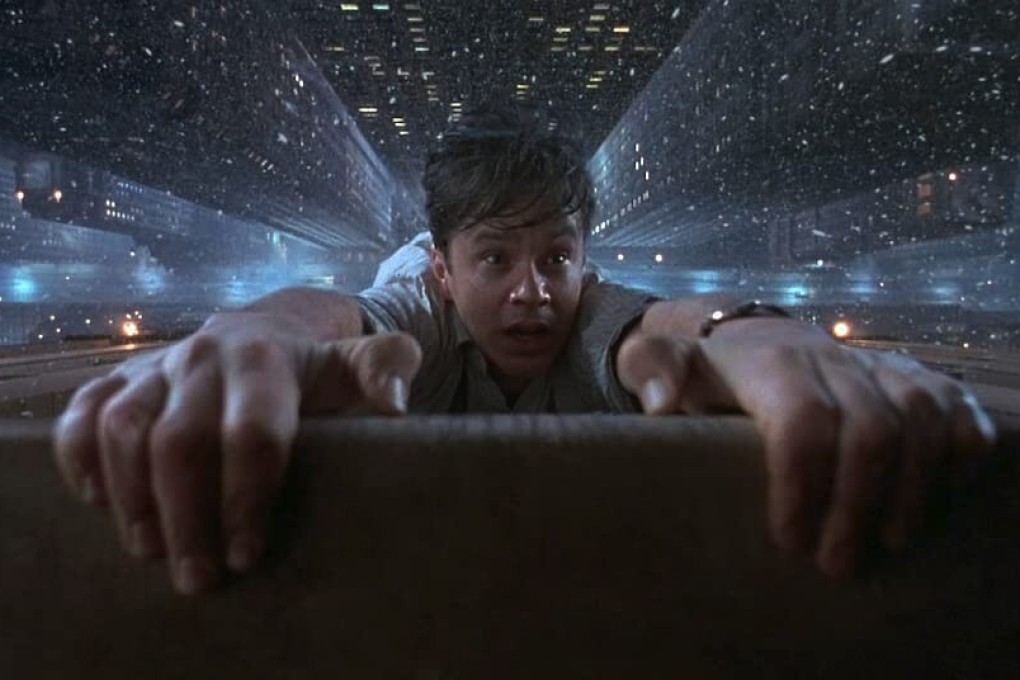 Tim Robbins in a still from The Hudsucker Proxy (1994), one of our pick of New Year-themed films with which to see in 2021 at home in front of the TV.