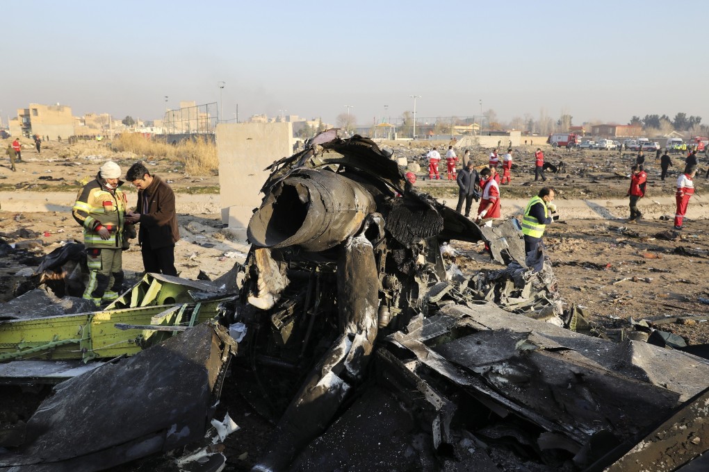 Debris litters the scene where a Ukrainian plane crashed near Tehran, Iran in January. Photo: AP