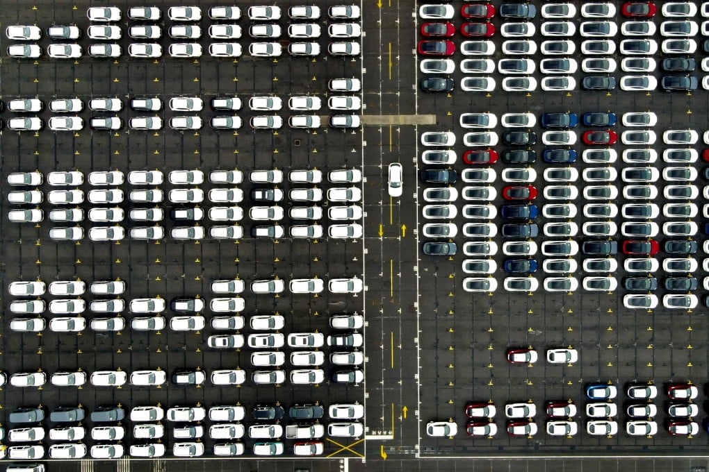 An aerial view of imported cars parked at Taipei Harbour in New Taipei City on December 8. While the world reels from the coronavirus pandemic, Taiwan is on track to end the year with enviable economic growth, buoyed in part by trade with mainland China. Photo: AFP
