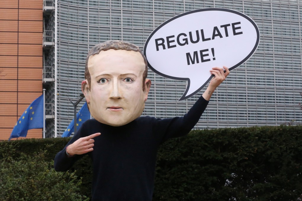 An activist wears a Mark Zuckerberg mask at a protest in Brussels, Belgium, on December 15. The US antitrust lawsuit against Facebook is a step towards the reregulating of information. Photo: Reuters