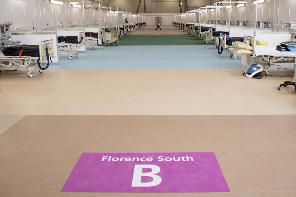 Beds that were set up inside the ExCel centre in London in March, 2020. Questions hang over the readiness of the field hospital. File photo: AFP
