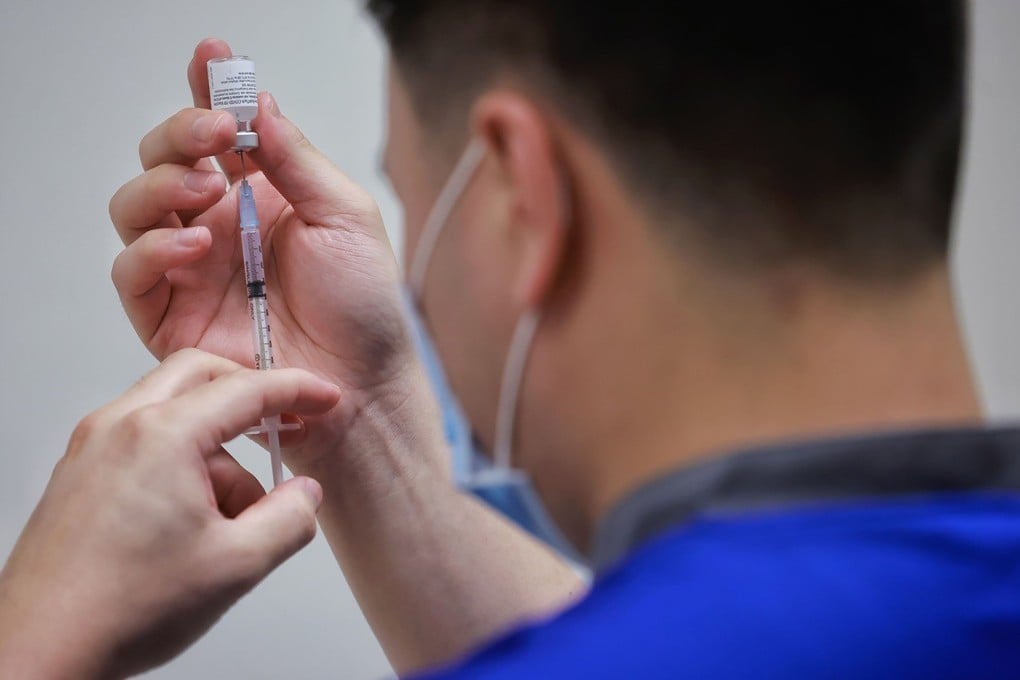 A nurse in Singapore prepares a Covid-19 vaccine shot. Photo: AFP