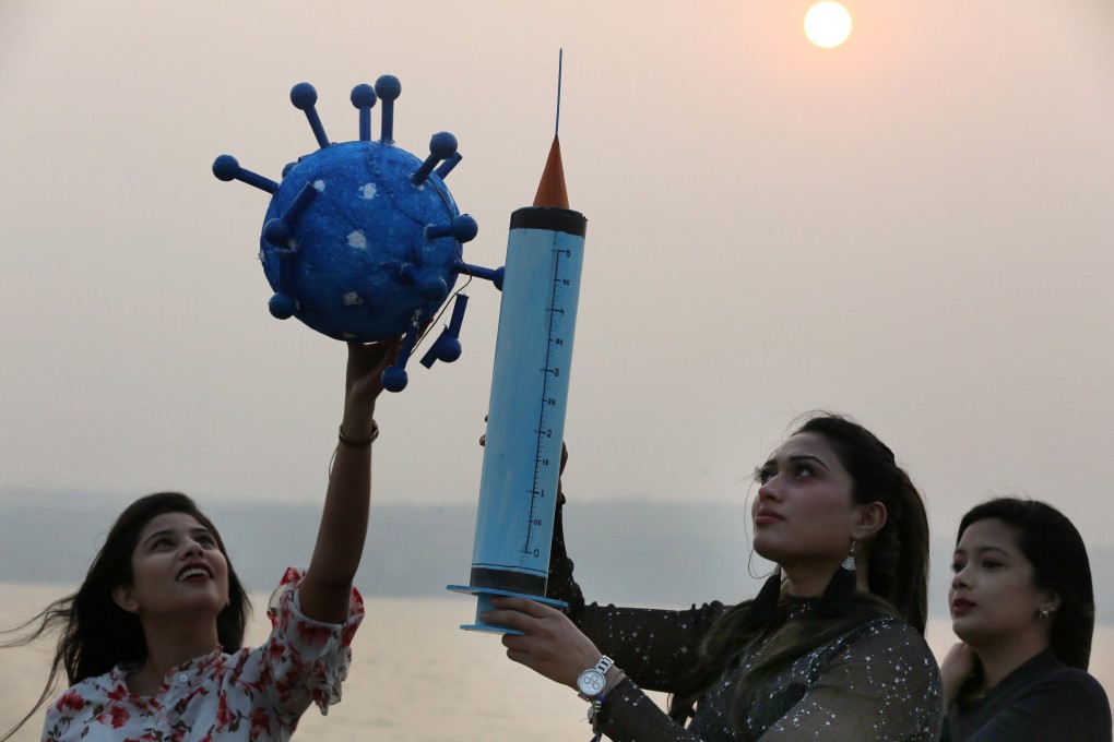 Indians celebrating New Year’s Eve while awaiting a vaccine. Photo: EPA