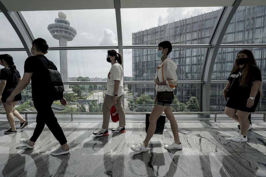Travellers at Singapore’s Changi Airport mall, which would likely have received increased traffic as a result of the high-speed rail project. Photo: EPA