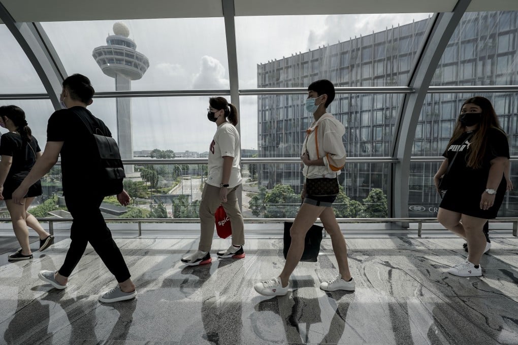 Travellers at Singapore’s Changi Airport mall, which would likely have received increased traffic as a result of the high-speed rail project. Photo: EPA