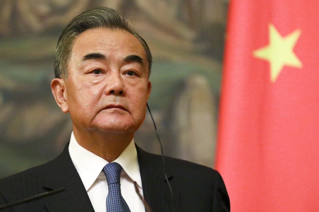Chinese Foreign Minister Wang Yi says China is resolutely against the politicisation of the pandemic. Photo: EPA-EFE