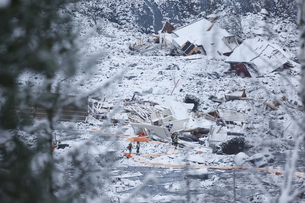 Rescue crews work in the area at Ask in Gjerdrum, Norway, on Saturday. Photo: NTB via AP