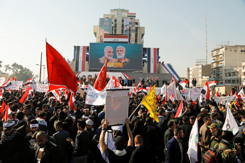 Iraqis gather to mark the first anniversary of the killing of top Iranian general Qassem Soleimani in Baghdad on Sunday. Photo: Reuters
