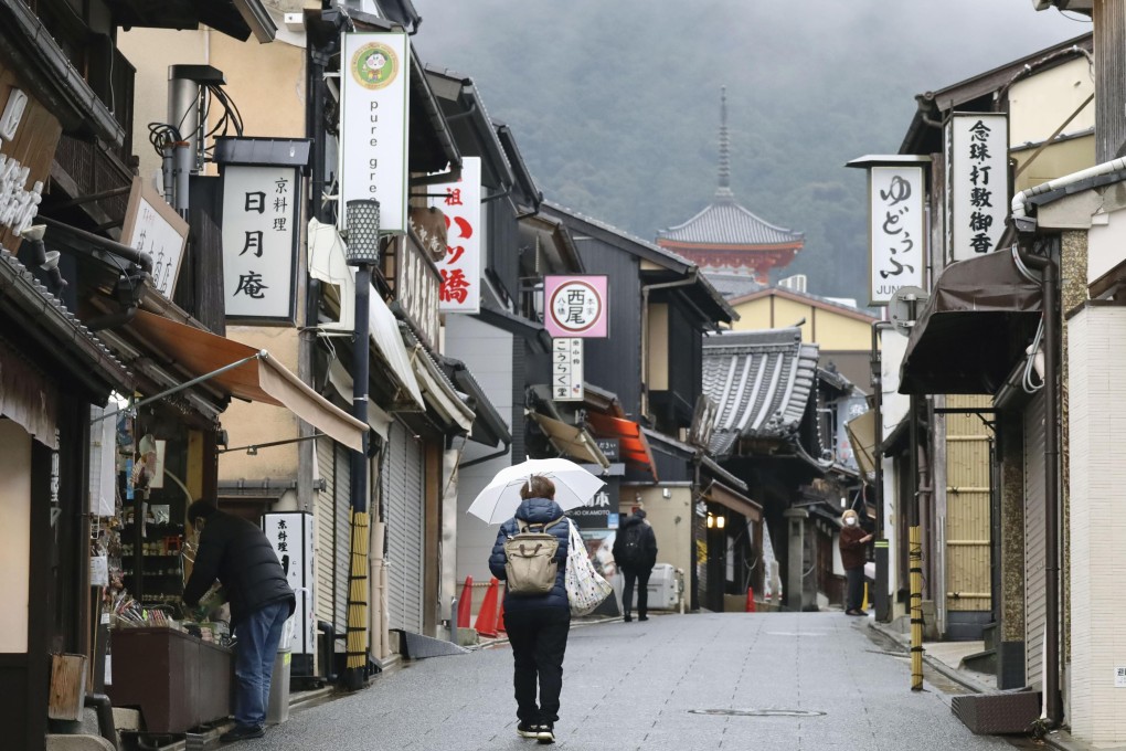 A street in Kyoto is virtually empty on December 28. Japan should recast its economy instead of depending on traditional sectors such as tourism. Photo: Kyodo