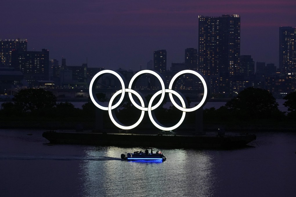 The Olympic rings float above the water in the Odaiba area of Tokyo. Photo: AP
