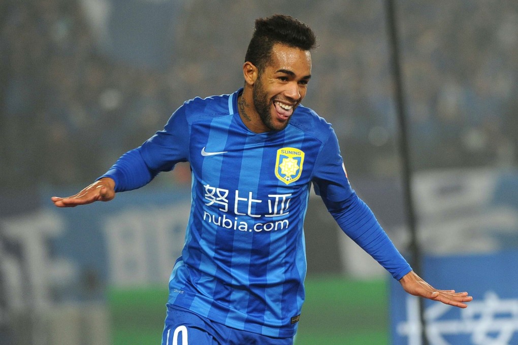 Jiangsu Suning's Alex Teixeira celebrates a goal against Shandong Luneng. Photo: AFP