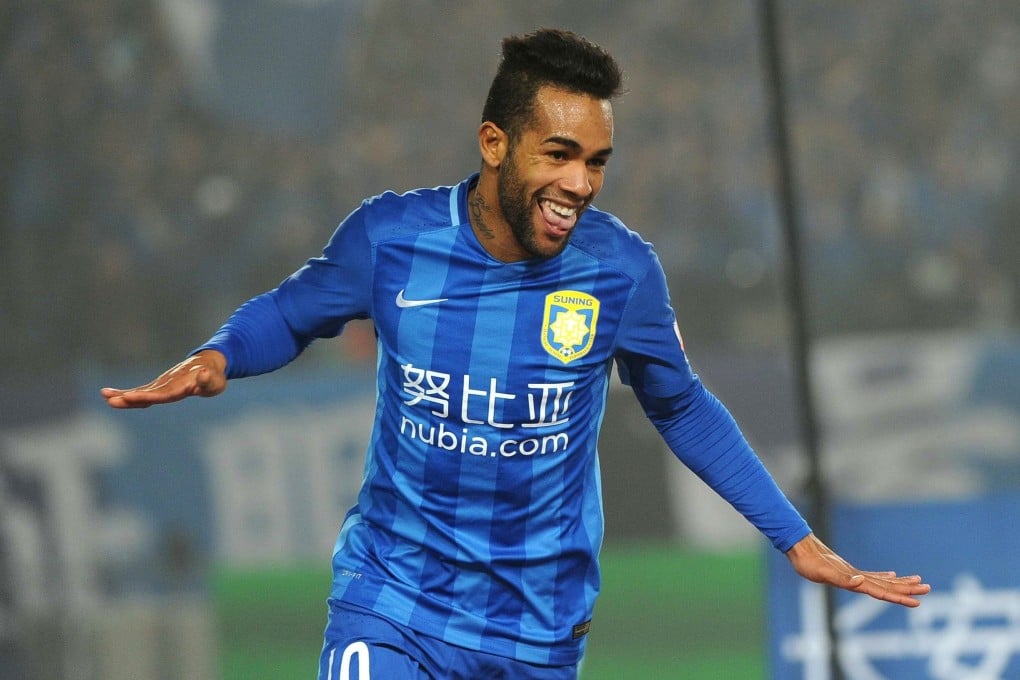 Jiangsu Suning's Alex Teixeira celebrates a goal against Shandong Luneng. Photo: AFP