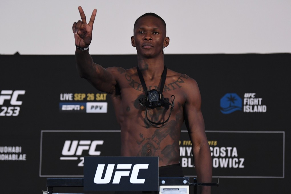 Israel Adesanya poses on the scale during the UFC 253 weigh-in on September 25, 2020 at Flash Forum on UFC Fight Island, Abu Dhabi, United Arab Emirates. Photo: Josh Hedges/Zuffa LLC via Getty Images