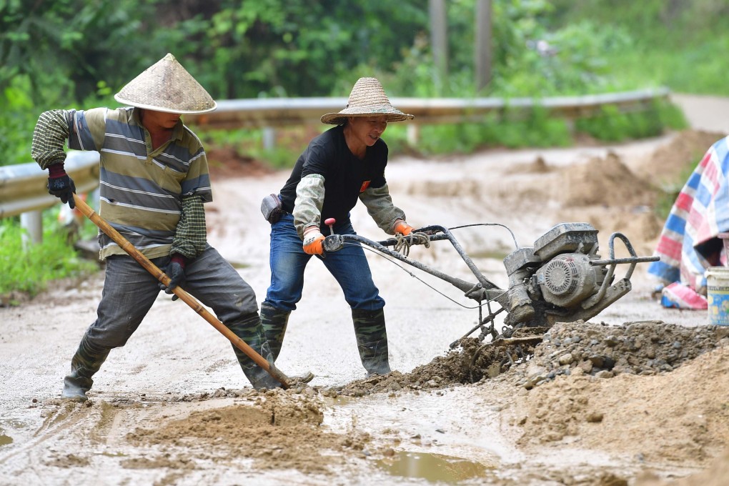 Villagers renovate a rural road in south China’s Guangxi Zhuang Autonomous Region, a mountainous region plagued by poverty. Photo: Xinhua