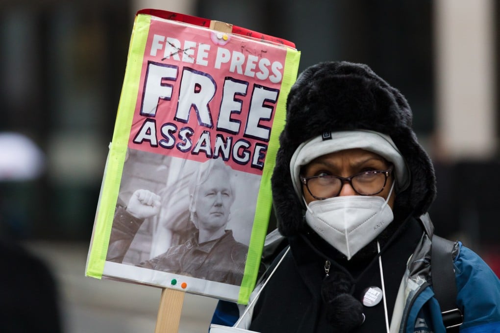 A protester outside the trial of WikiLeaks founder Julian Assange at the Old Bailey in London. Photo: EPA
