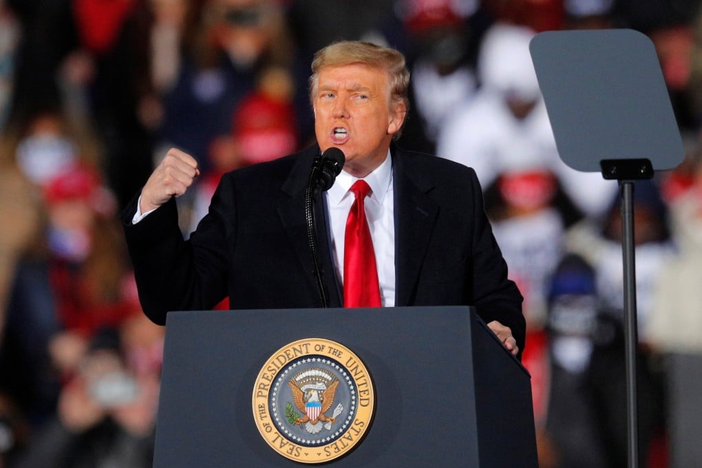 US President Donald Trump gestures while campaigning in Georgia on the eve of a run-off election to decide both of the state’s Senate seats. Photo: Reuters