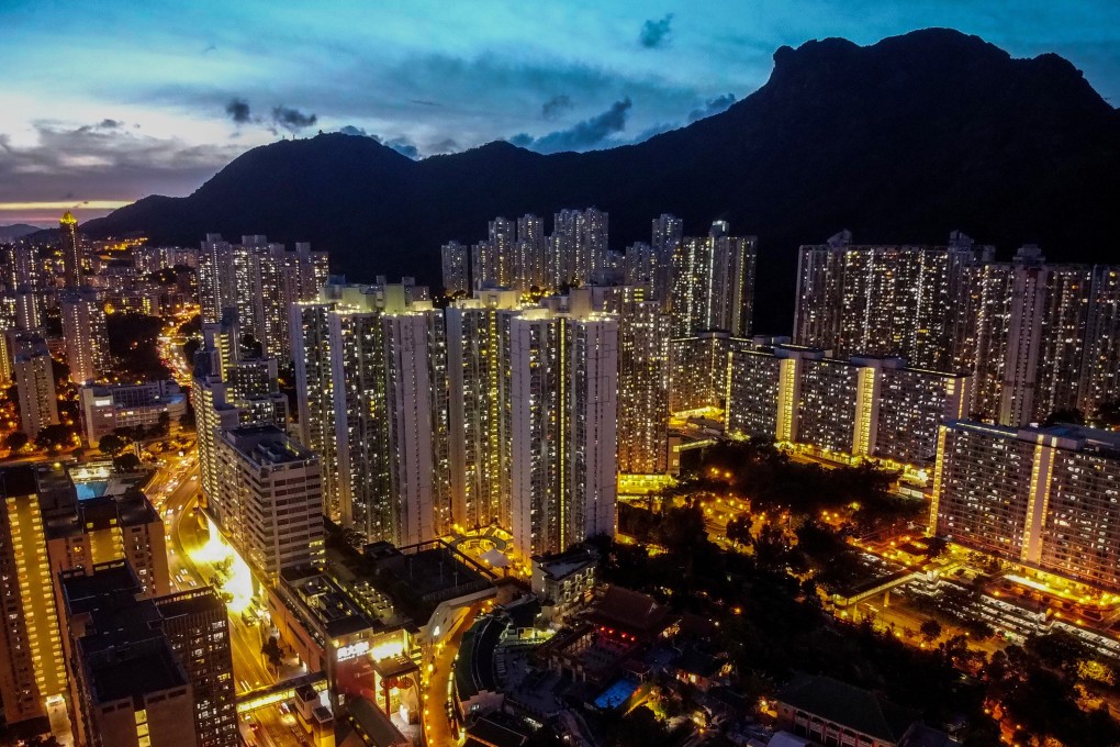 Hong Kong’s residential buildings gleam in the twilight in Wong Tai Sin on Kowloon. Hong Kong has for years held the dubious distinction of being world’s least affordable housing market. Photo: Sun Yeung