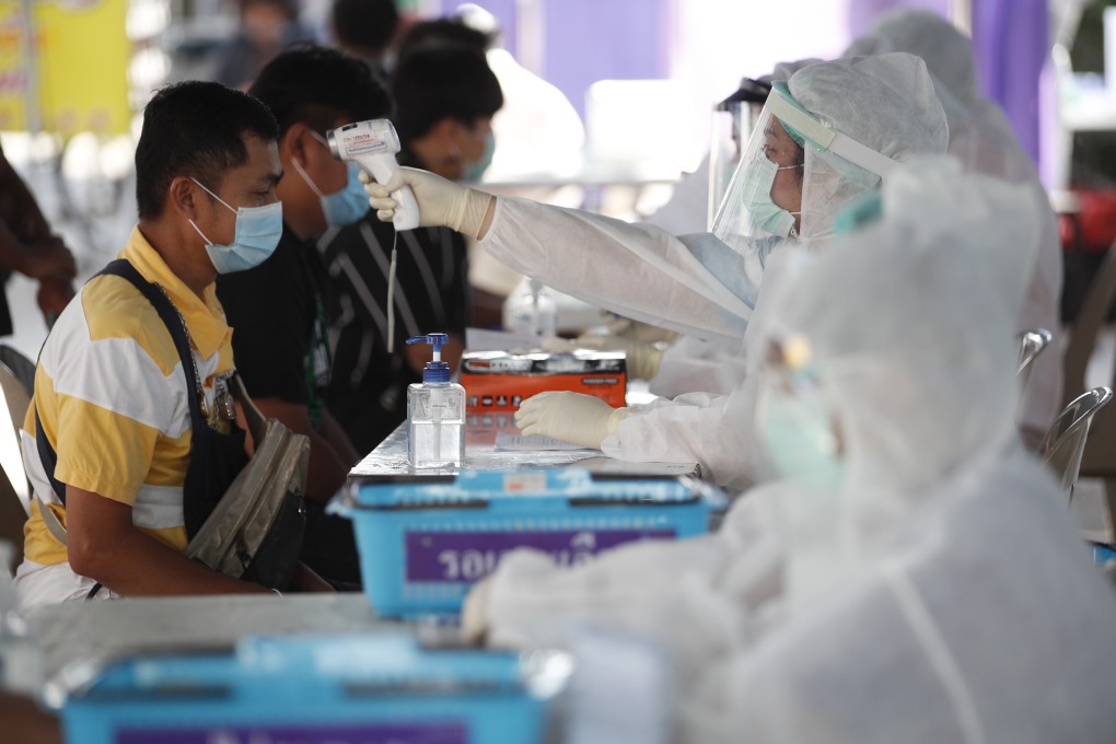 Residents of Nonthaburi province undergo Covid-19 testing on Monday amid a resurgence of the virus. Photo: EPA-EFE