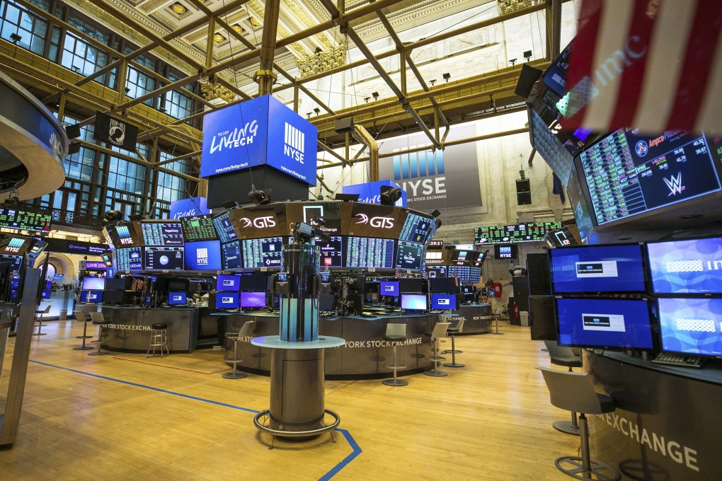 A view from an unoccupied NYSE trading floor in March 2020. The New York Stock Exchange is mulling a second U-turn about its plan to delist three Chinese telecommunications companies, whipsawing markets. Photo: AP