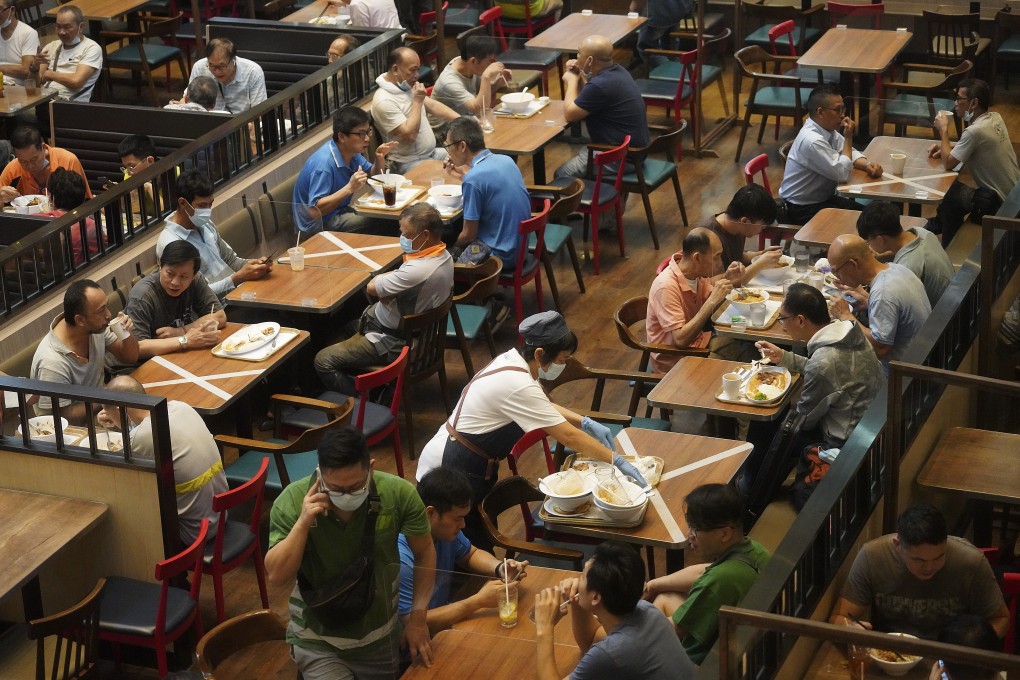 Customers have their lunch in Admiralty, Hong Kong, despite coronavirus restrictions. Photo: Winson Wong